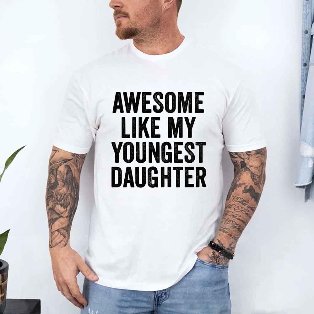 Parent wearing Awesome Like My Youngest Daughter Shirt with funny print in casual setting