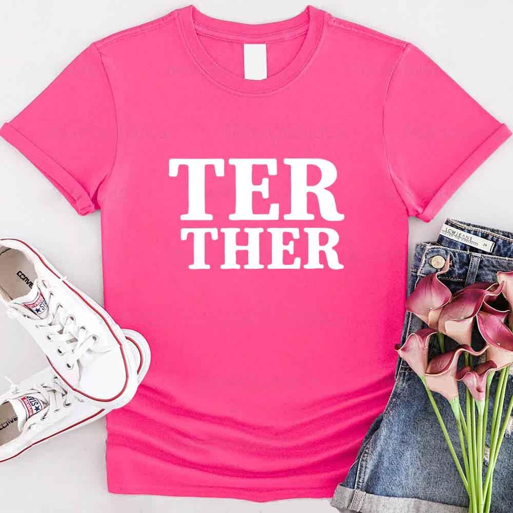 Couple wearing matching Better Together Couples Tee with love-themed design