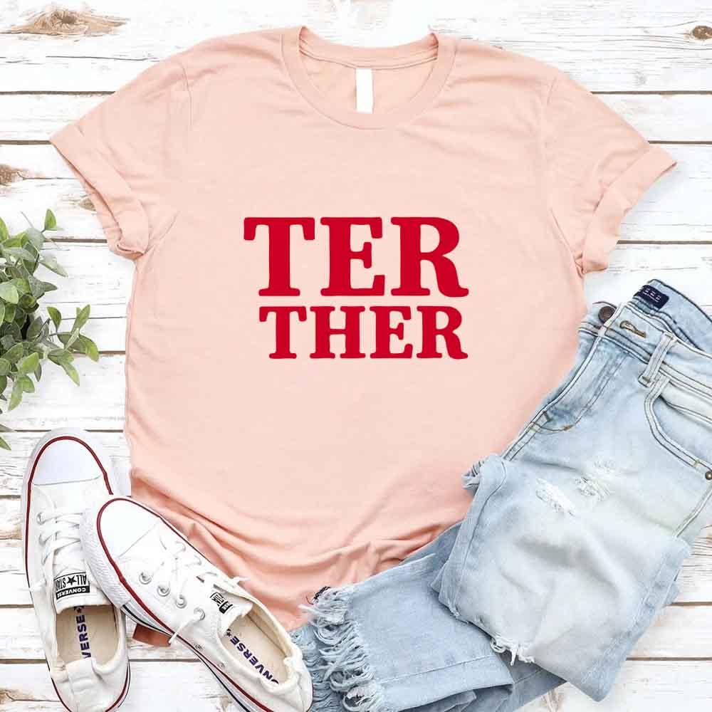 Couple wearing matching Better Together Couples Tee shirts celebrating love and connection