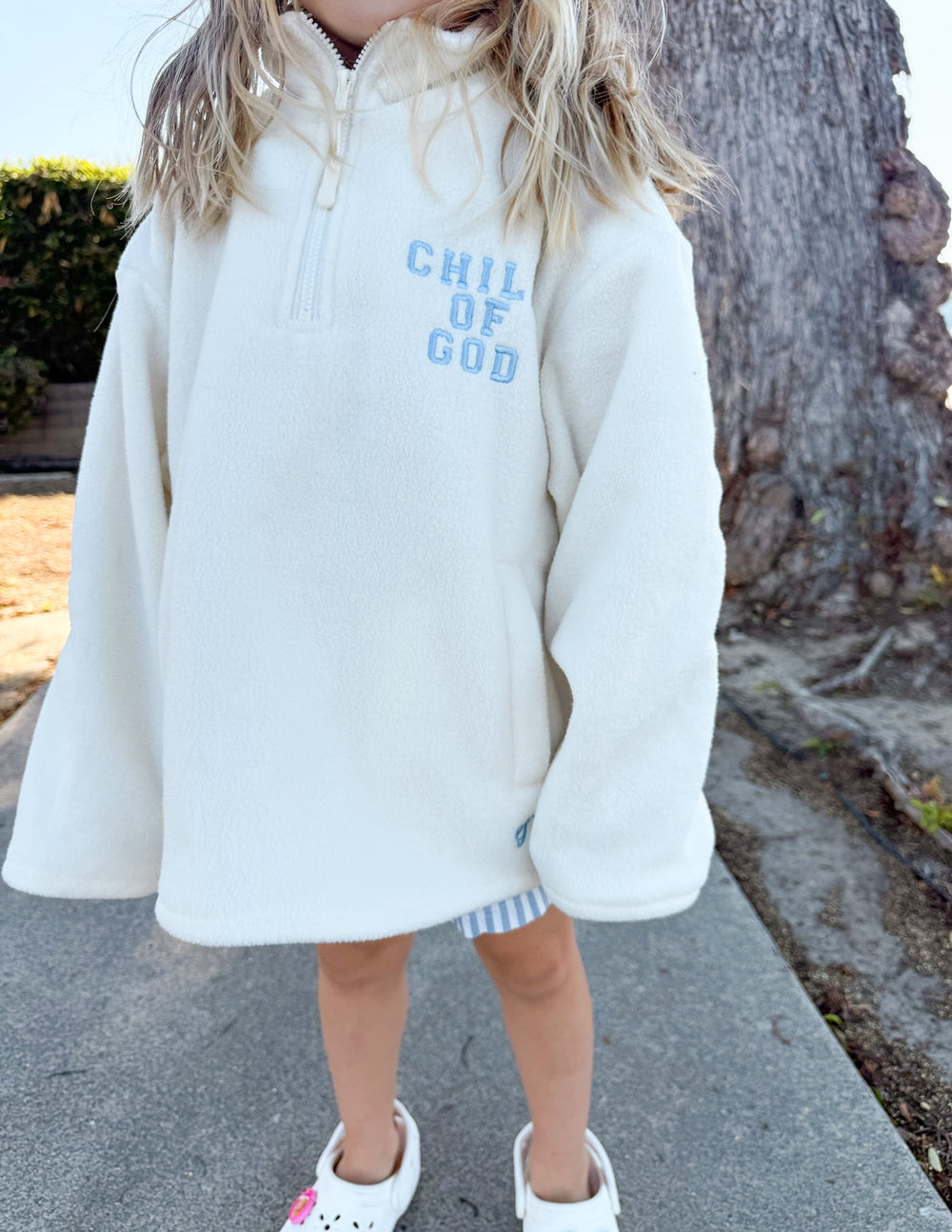 Cream oversized Child of God fleece kids pullover with embroidery and soft polyester fabric