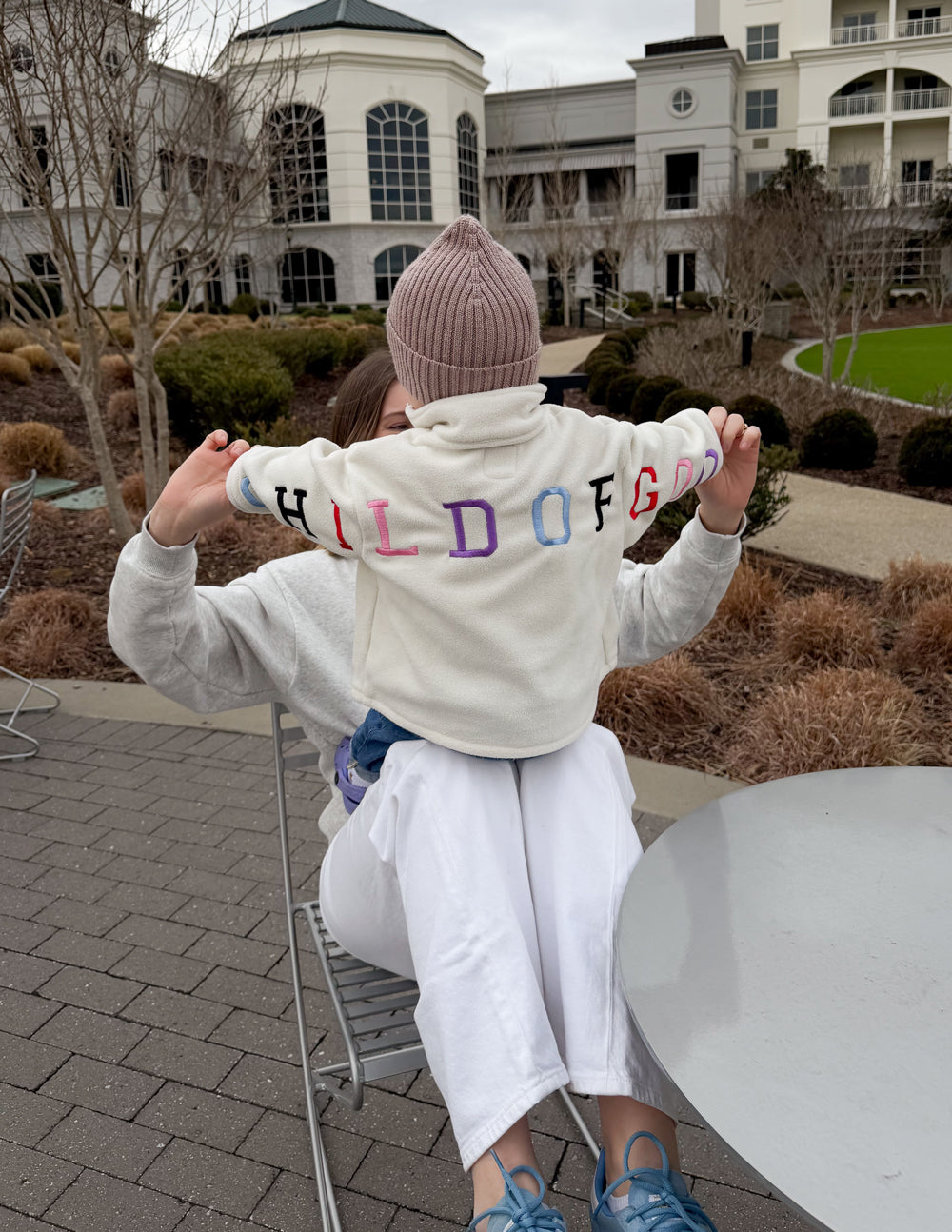 Cream oversized Child of God fleece kids pullover with embroidered faith design and super soft polyester fabric