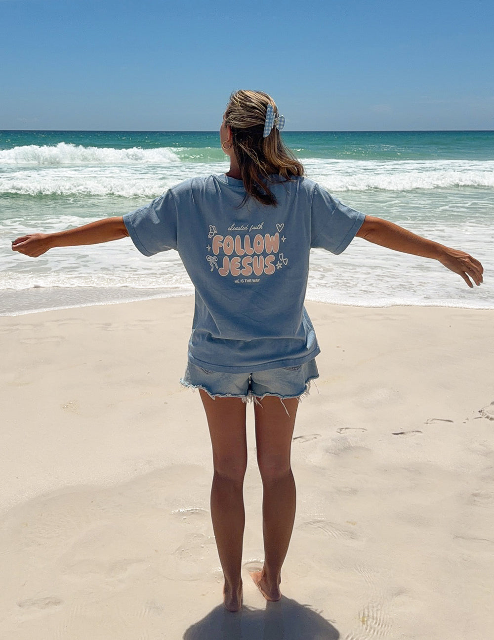 Bluebell Follow Jesus Unisex Tee with John 1:51b scripture and puff print, oversized fit on model