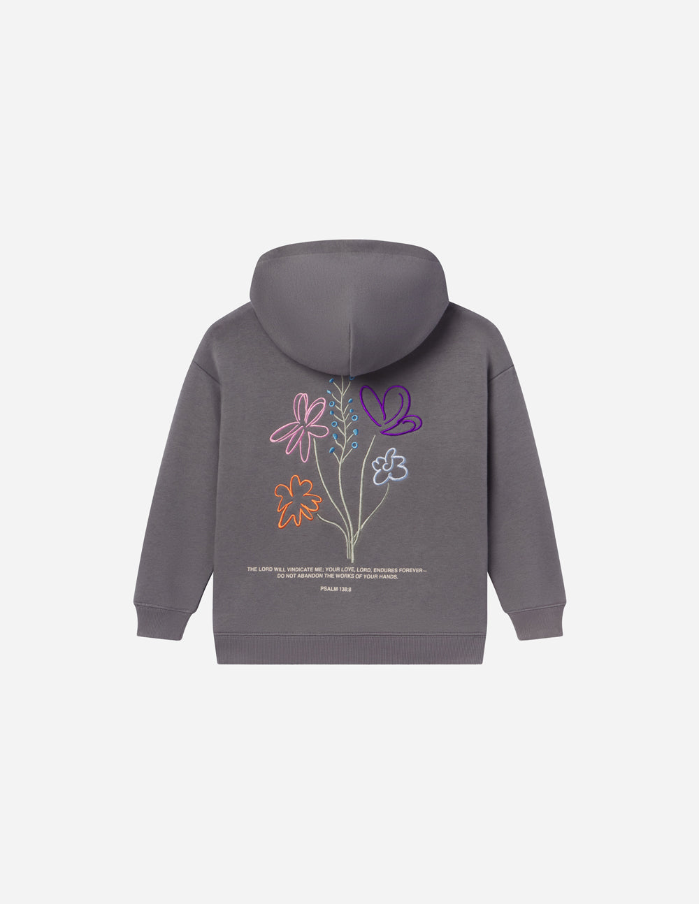 Kids wearing oversized Sedona Sage God's Still Working hoodie with embroidered Psalm 138:8 design