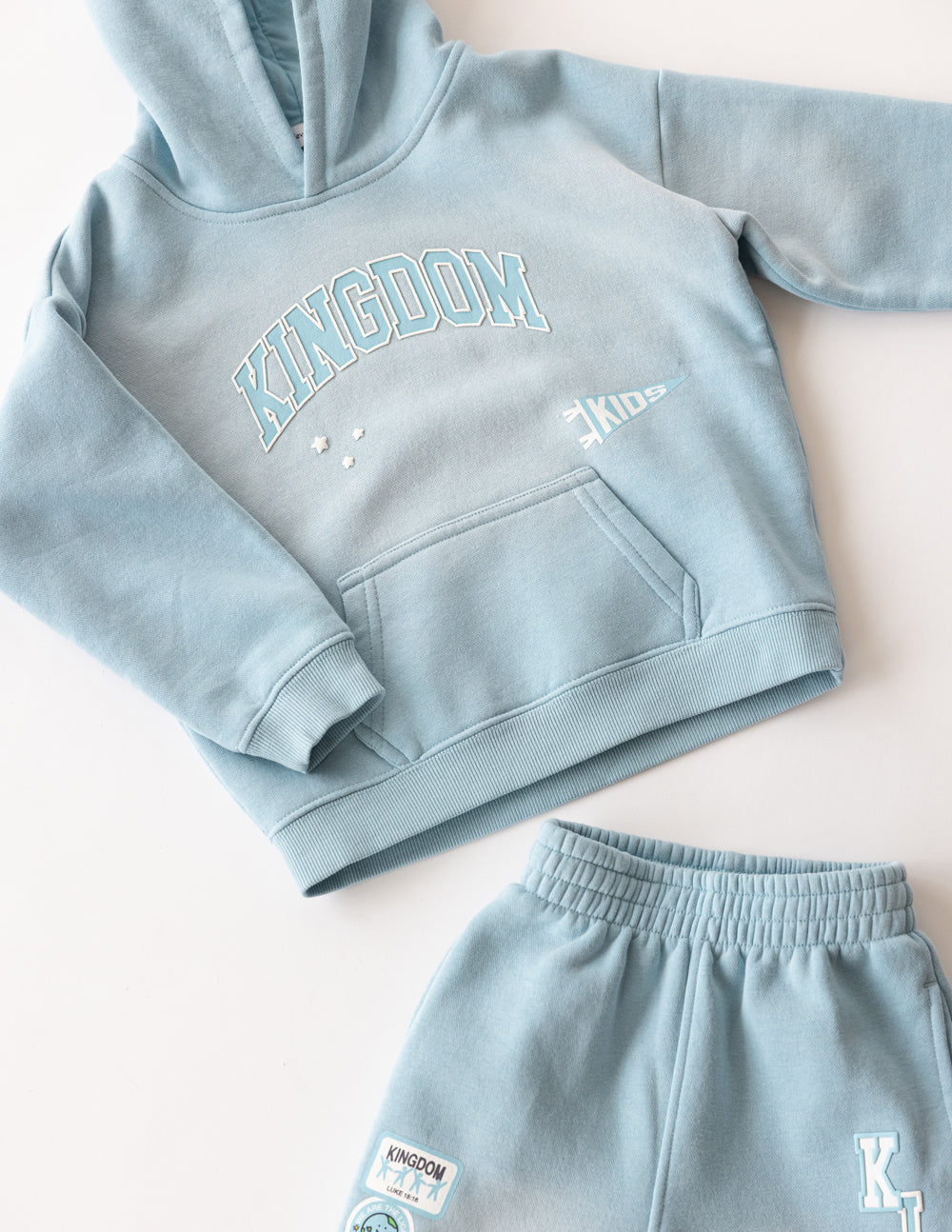 Kids' oversized Kingdom Kids Hoodie in air blue, super soft cotton-polyester blend with puff print and scripture design