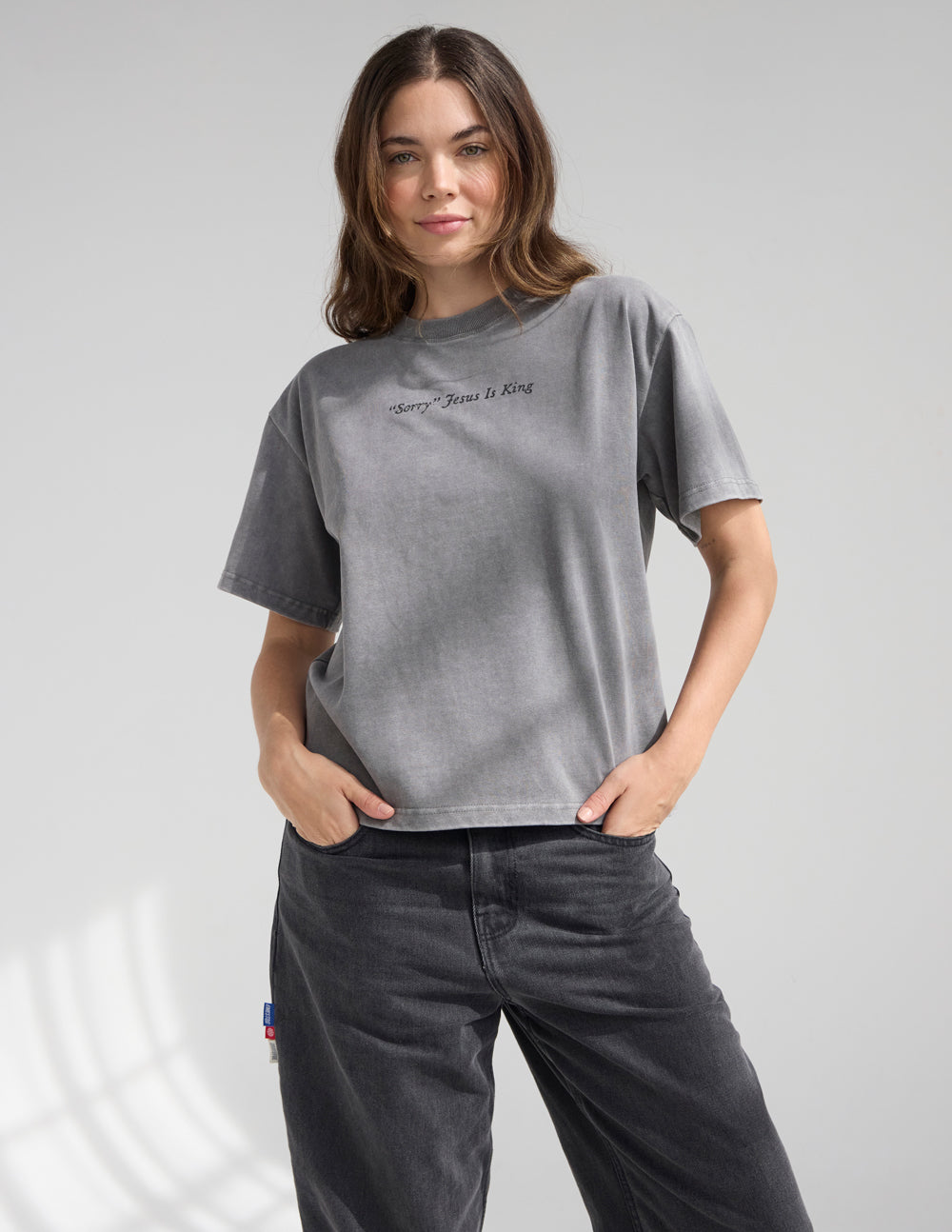 Not Sorry Jesus Is King heavyweight tee in spire grey with embroidered strikethrough and oversized applique lettering