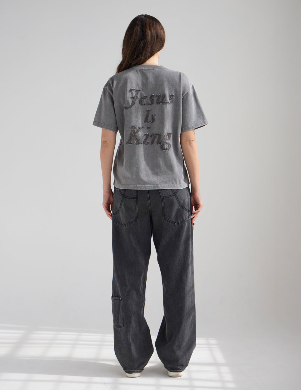 Not Sorry Jesus Is King heavyweight tee in spire grey with embroidered strikethrough and oversized appliqué lettering