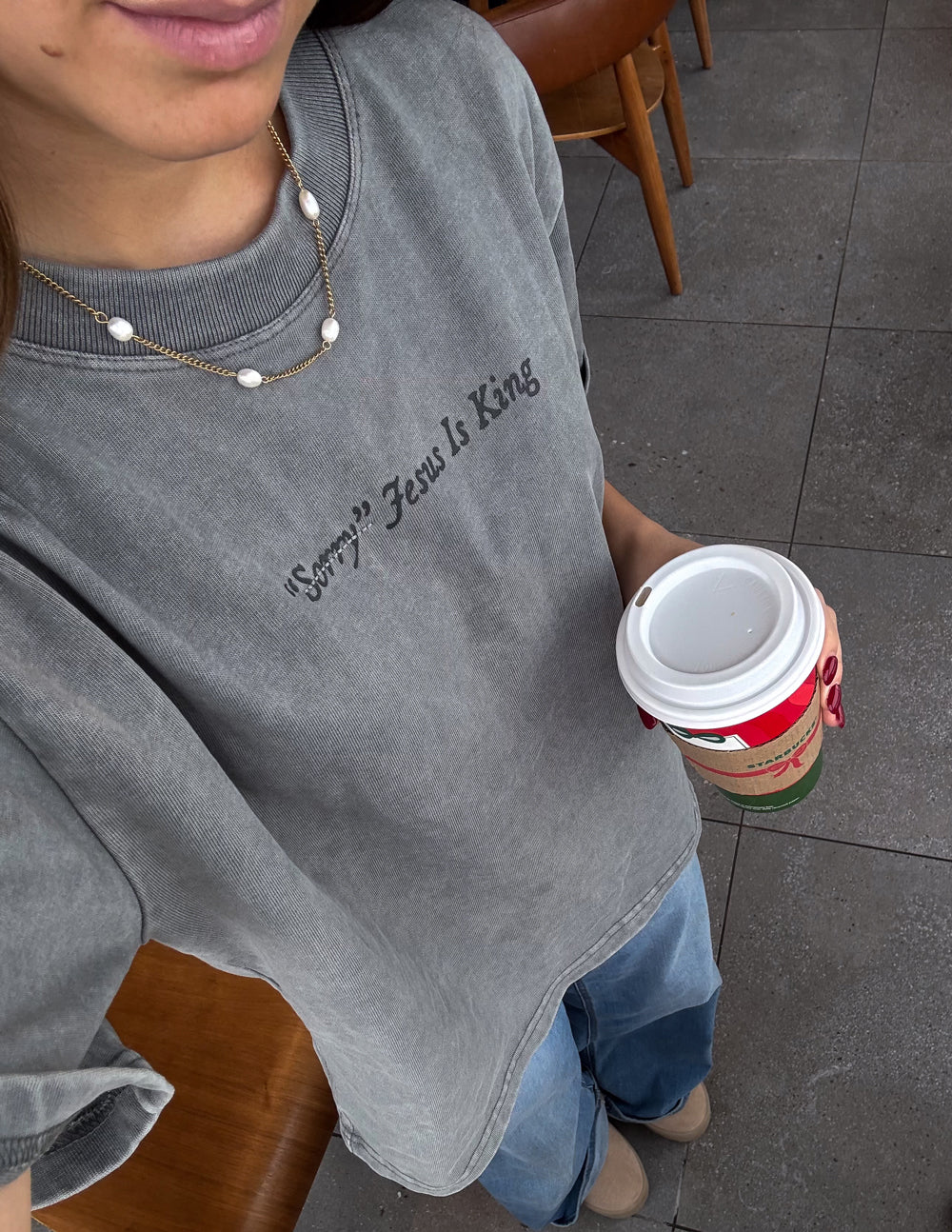 Not Sorry Jesus Is King heavyweight tee in spire grey with embroidered strikethrough and oversized appliqué lettering