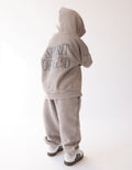 Kids wearing oversized Spirit of God hoodie in echo color, cozy and soft fabric, featuring 2 Corinthians 3:17 quote