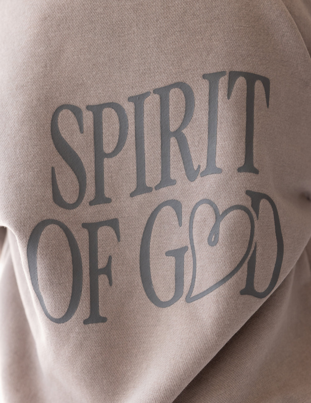 Child wearing oversized Spirit of God Kids Hoodie in echo color, cozy and soft fabric with 2 Corinthians 3:17 scripture design