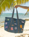 Large everyday denim tote bag with iron-on faith-inspired patches and exterior pockets