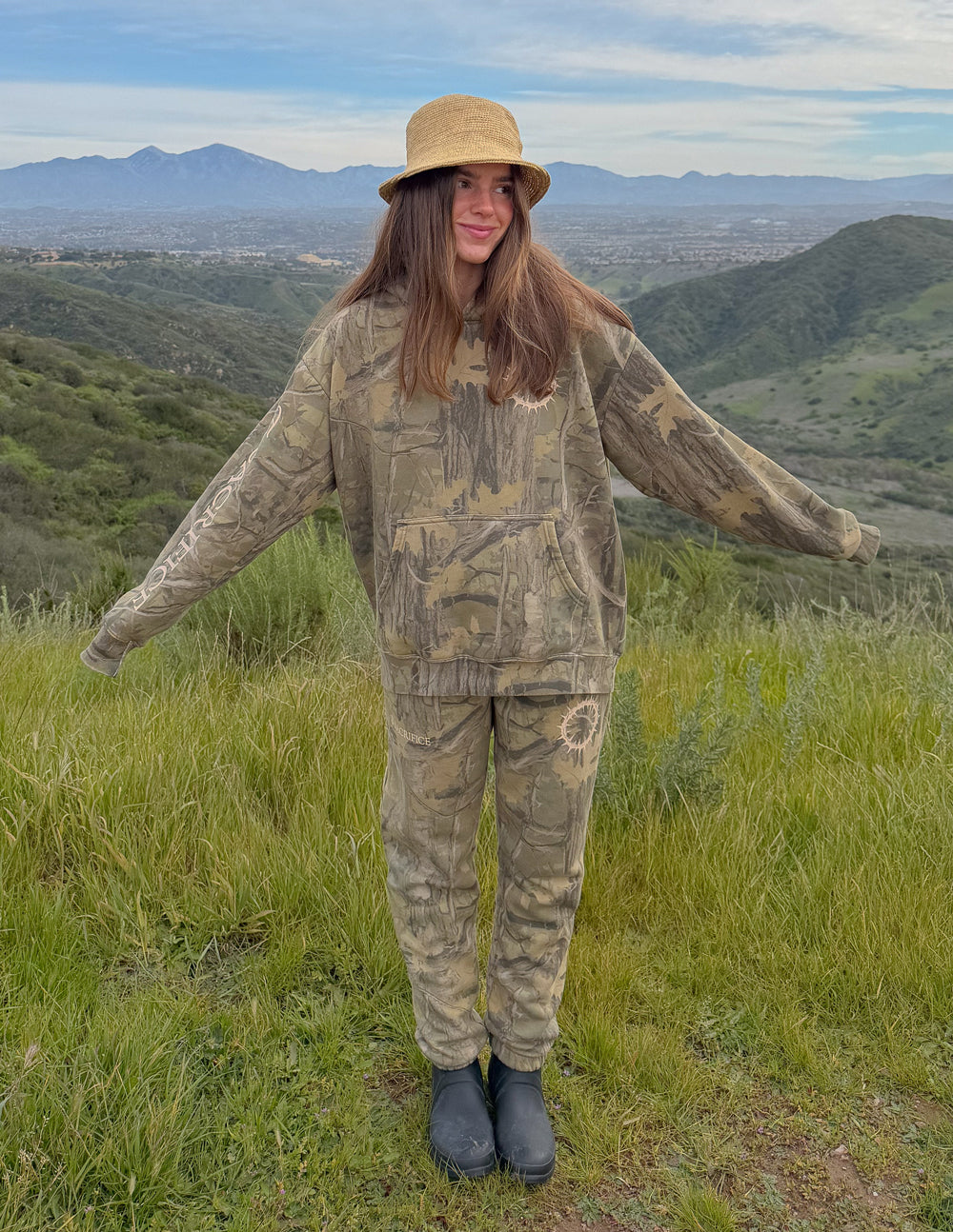 The Sacrifice Camo Hoodie, unisex forest camo hoodie with 1 Corinthians 15:55 verse, garment dyed and super soft design