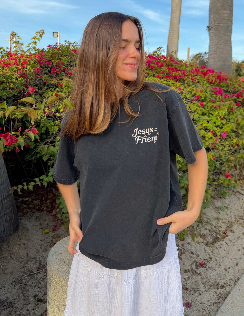 Black heavyweight cotton tee with "What a Friend in Jesus" design and John 15:15 scripture, modern relaxed fit.