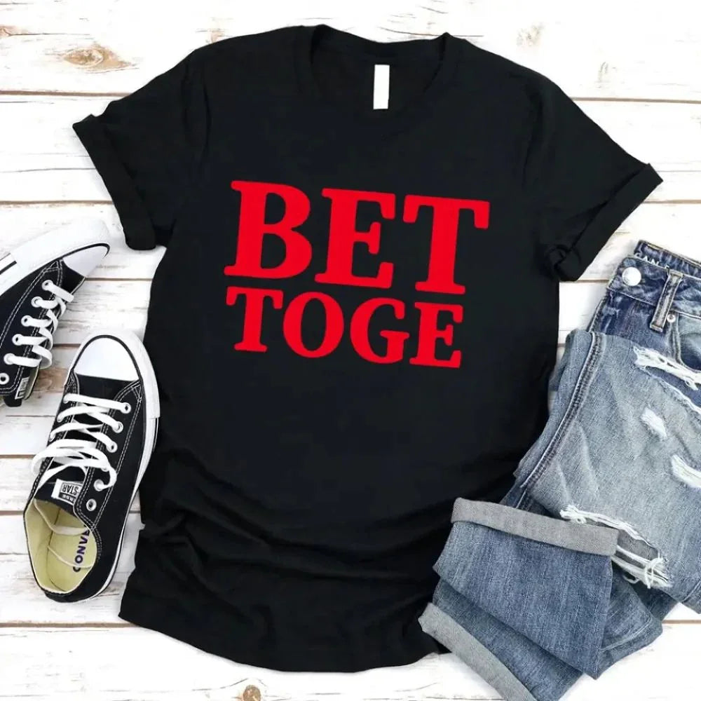 Couple wearing matching Better Together Couples Tee shirts showing love and connection