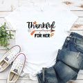 Couple wearing matching Thankful For Her and Thankful For Him Valentine’s Day t-shirts in soft cotton